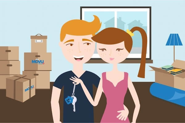 A Couple Moving Into The New Apartment And Holding Key A Couple Moving Into The New Apartment And Holding Key
